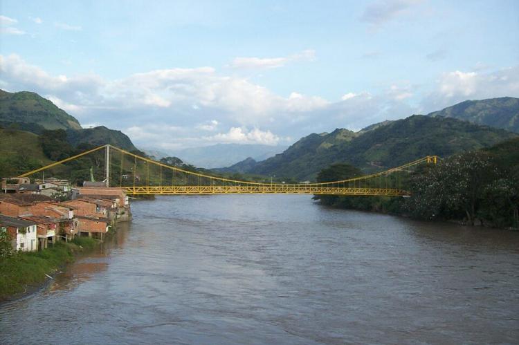 Cauca River, as it passes between the departments of Caldas and Antioquia, Colombia
