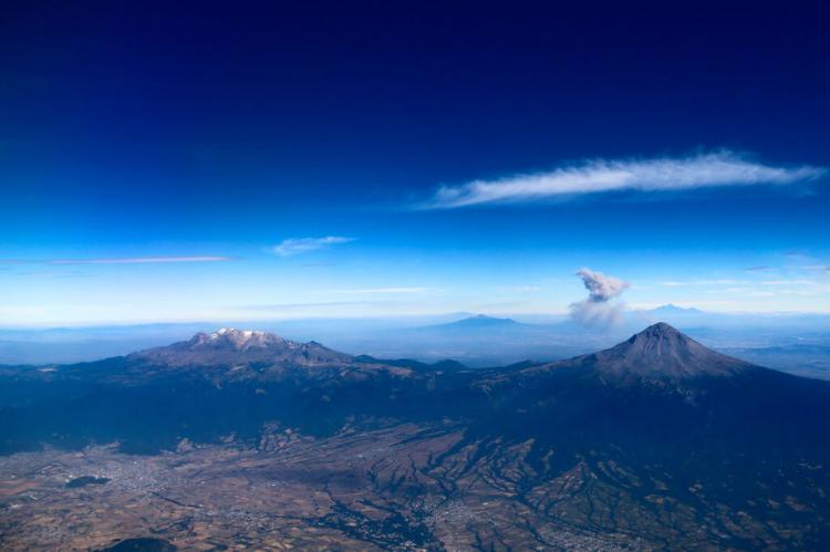 Aerial view of Eje Neovolcánico Transversal, Mexico: Ixtaccíhuatl, Cofre de Perote, Popocatepetl, Pico de Orizaba