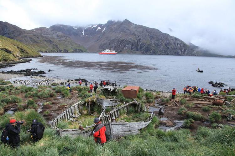 The M/S Expedition cruise ship waits for her passengers to return from Godthul, South Georgia
