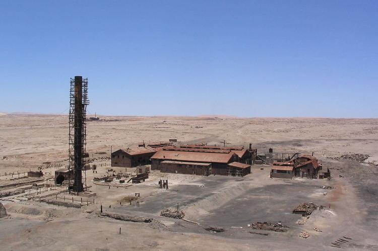 Old factory buildings in the abandoned city of Humberstone, Chile