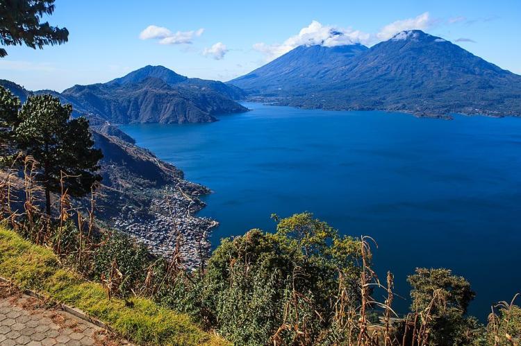 Lake Atitlan, the Tolimán (right) and Atitlán volcanoes, the town of San Antonio Palopó, Guatemala