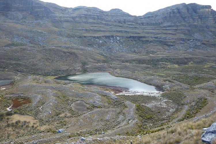 View of glacial, U-shaped valley with several small recessional moraines and a moraine-dammed lake, Sierra Nevada del Cocuy area, Colombia