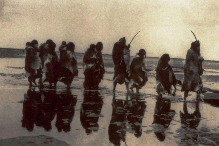 Selk'nam group on a beach in Tierra del Fuego in 1930
