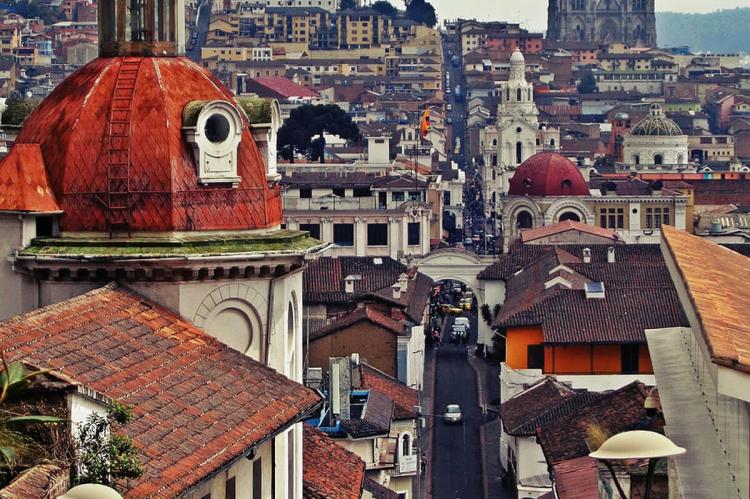 Quito, Ecuador street view with Basílica del Voto Nacional in background