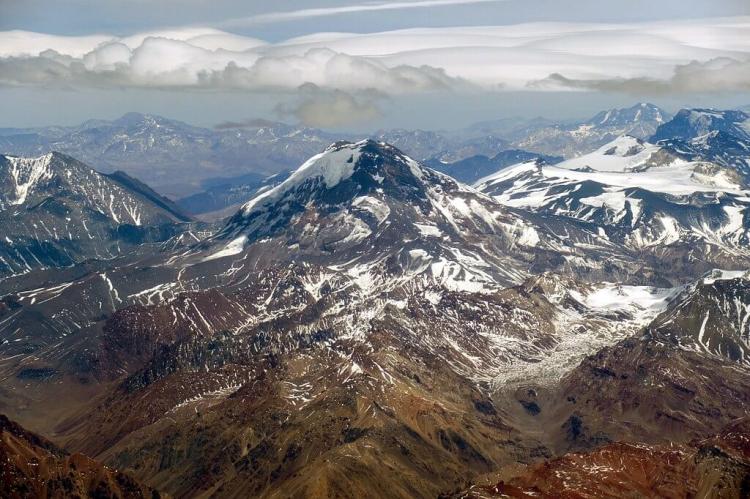 Tupungato and Tupungatito volcanoes with Maipo volcano in the distance, Chile / Argentina