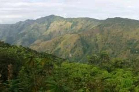 The Tête Bœuf mountain chain, seen in this panorama from Bonnet Carre, is part of the Massif de la Hotte in Haiti.